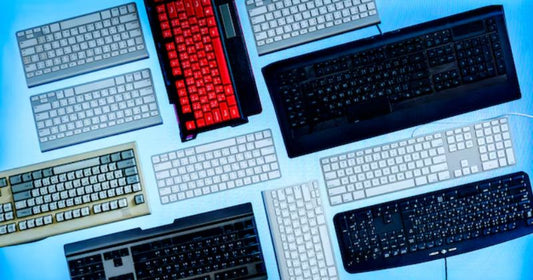 A variety of keyboards displayed, showcasing options for the best keyboard for blind person users.
