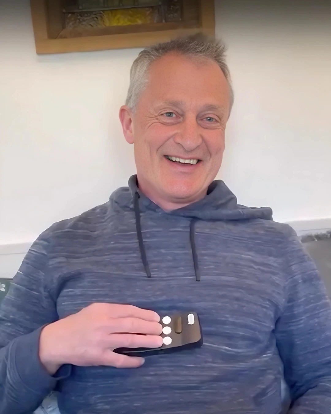 Man smiling and using his Hable One.