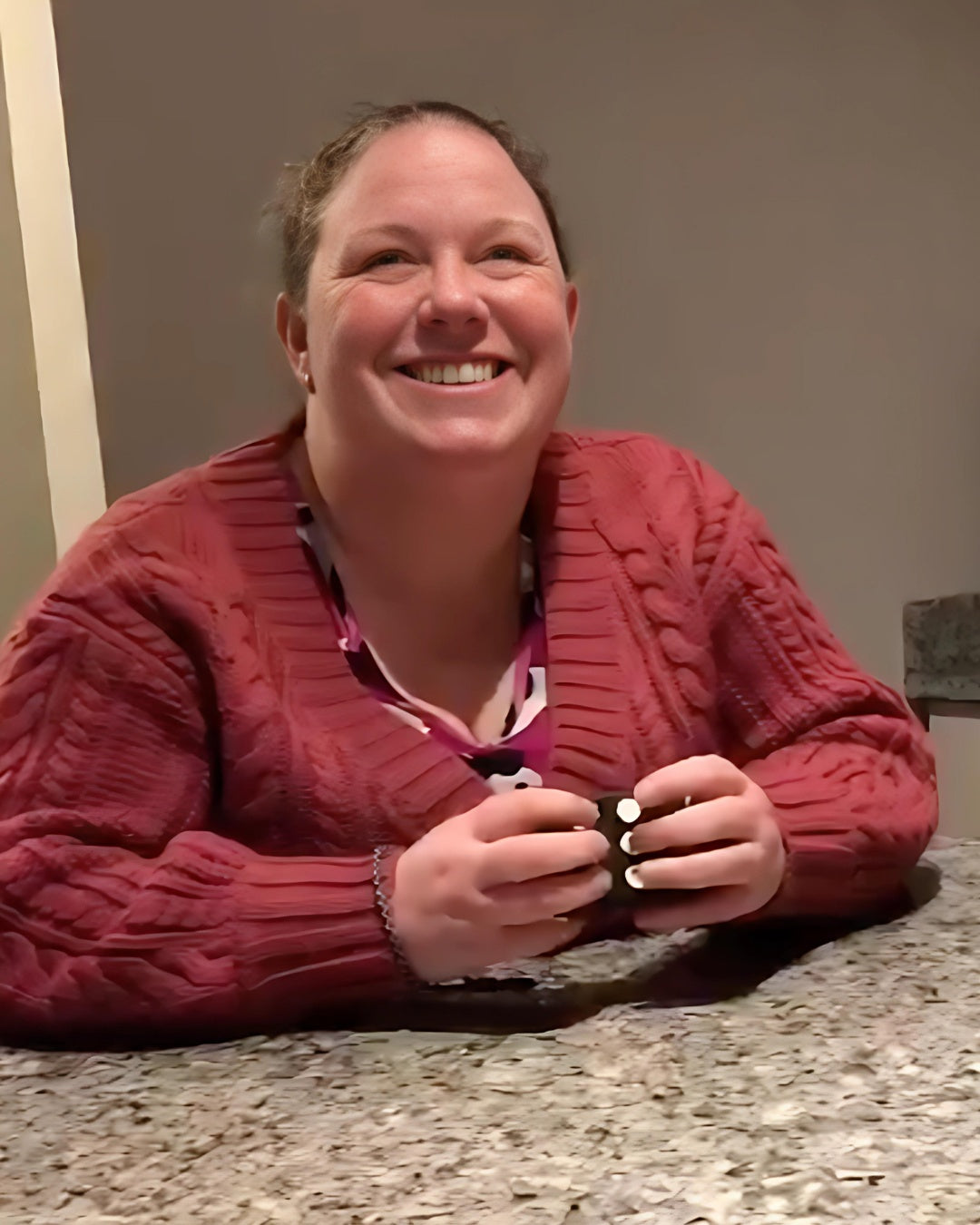 Woman smiling and using her Hable One