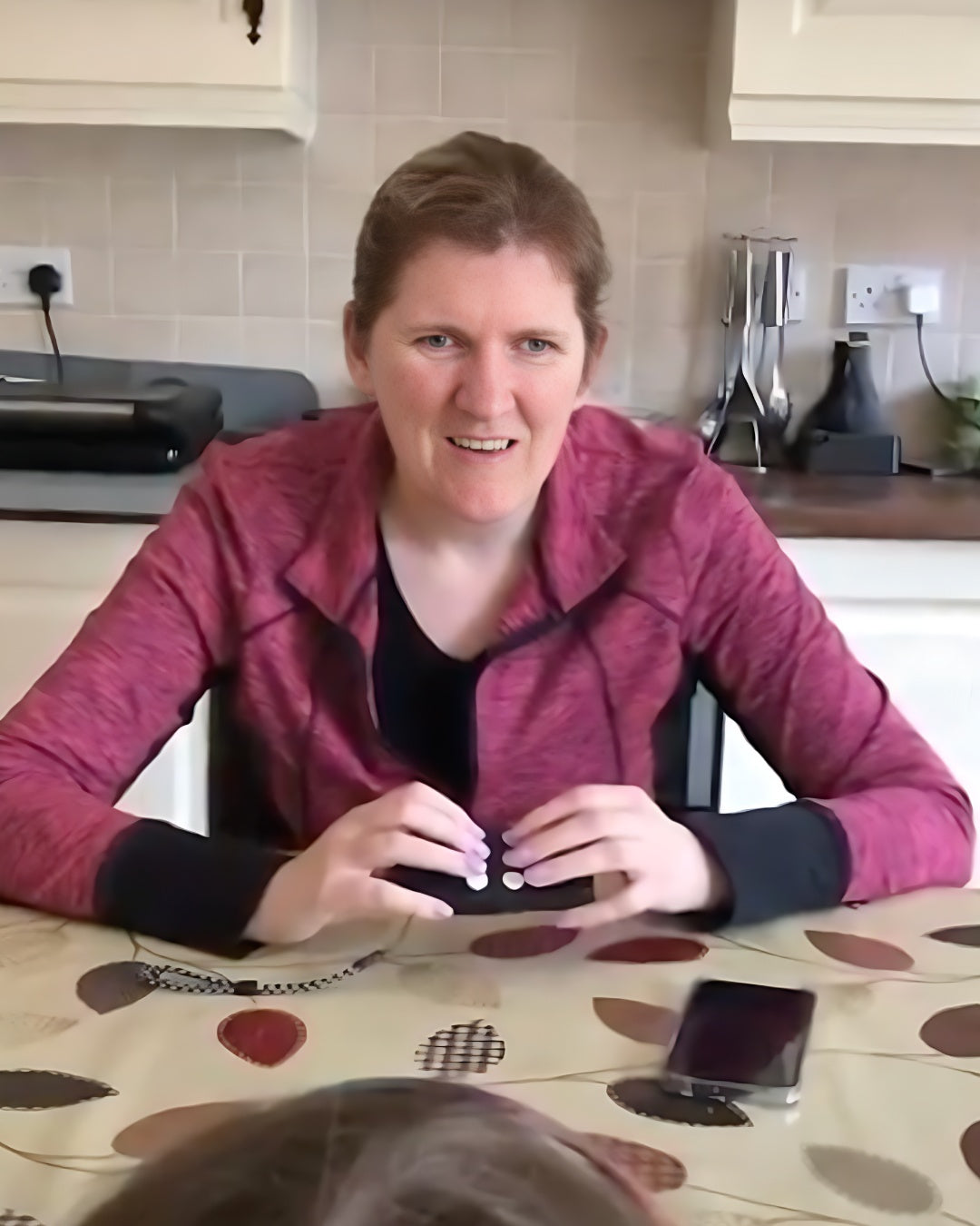 Woman smiling and using her Hable One