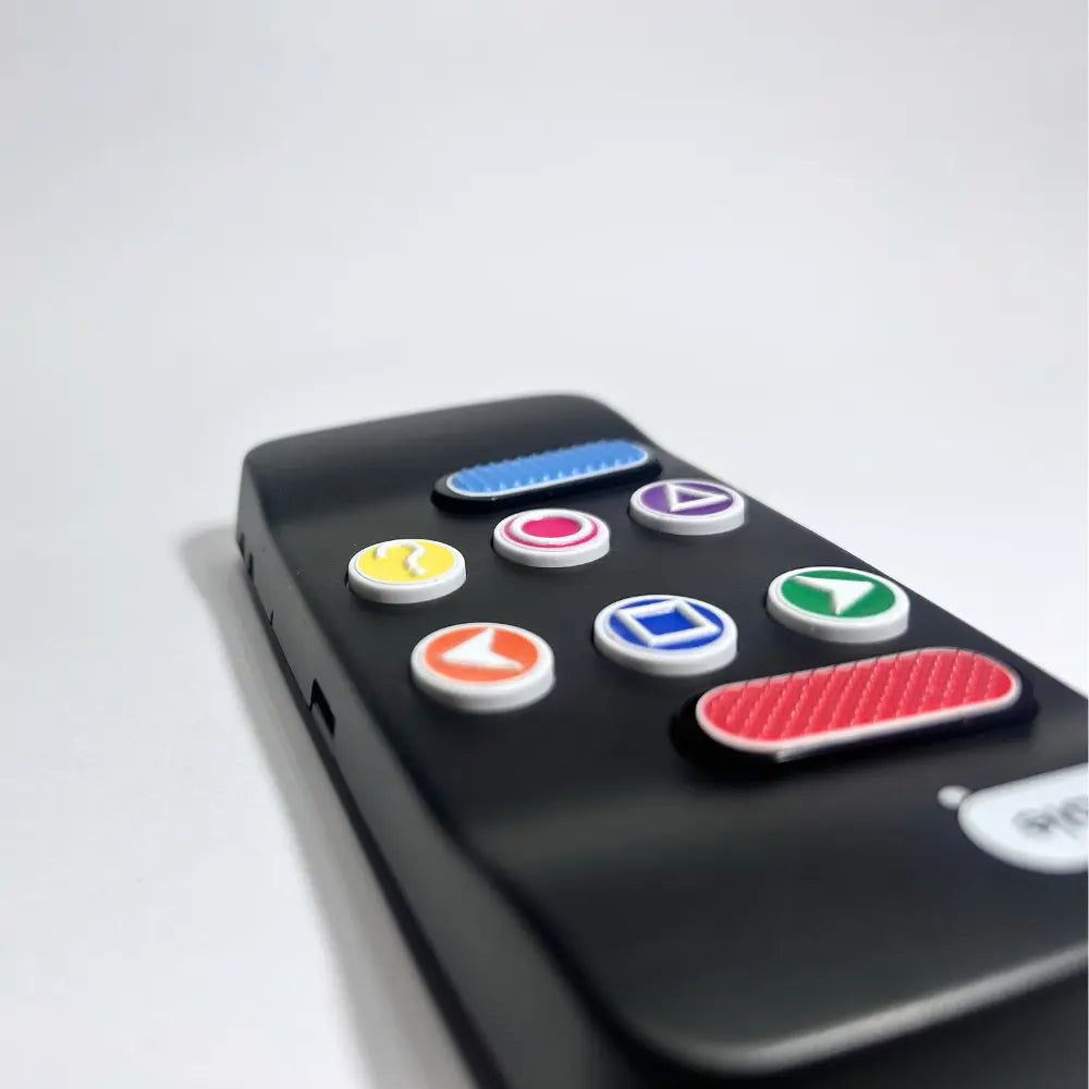 Side view of the Hable Easy, showing high contrast Tactile stickers on the buttons. Ranging from arrows, to circles to textures surfaces.