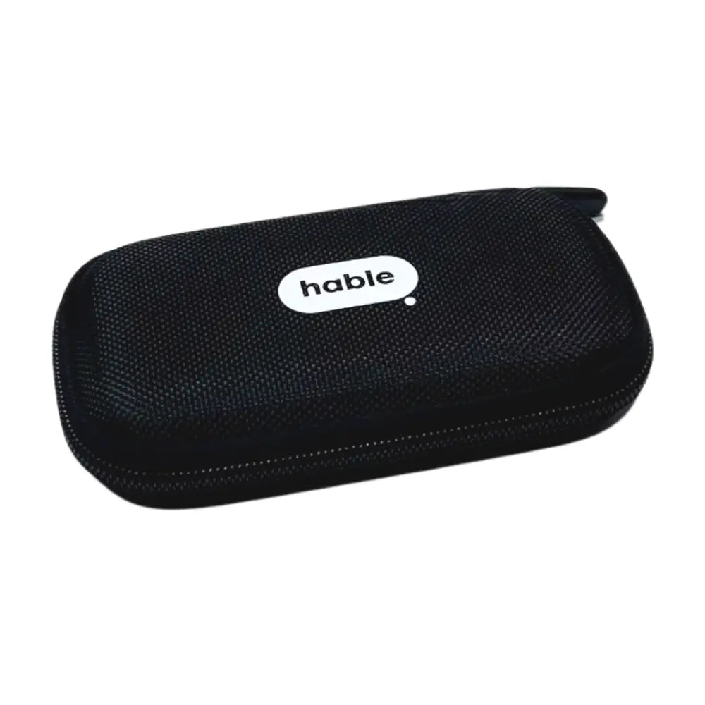 Closed black hard-shell Hable carry case with a woven fabric texture, rounded corners, and a white oval "hable" logo in the center top.