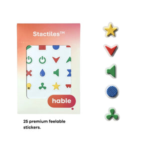 The Hable Stactiles General Utility retail box is shown next to five individual sample stickers arranged vertically: a yellow star, a red chevron, a green speaker icon, a blue textured circle, and a green three-leaf symbol. Text at the bottom states: "25 premium feelable stickers."