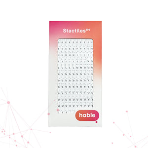 Front view of the Stactiles Braille Stickers retail packaging. A clean white envelope featuring a vibrant orange and pink gradient header with the Stactiles logo and a clear window displaying the tactile alphabet stickers inside.