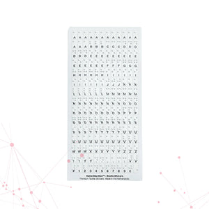 A complete sheet of 180 Stactiles tactile stickers. The sheet displays the full alphabet, numbers 0 through 9, and punctuation symbols. Each sticker features a high-contrast black visual character with transparent, raised Braille dots perfectly centered on top.