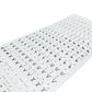 Close-up, angled perspective shot of Stactiles Braille stickers highlighting the high-quality, UV-embossed tactile dots. The image shows the crisp height of the Braille cells over the visual letters U through Z, demonstrating the durable and professional finish of the stickers.