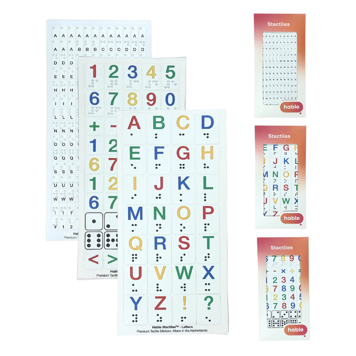 Product photo showcasing the full Hable Stactiles Braille Collection set of 3 without text overlays. The left side displays three overlapping tactile sticker sheets: a sheet with small clear tiny braille stickers, a sheet with bright colorful braille numbers, math operators, and dice patterns, and a main sheet with large, colorful alphabet letters (A–Z) accompanied by tactile braille dots underneath. On the right side, three slim retail boxes show the packaged sticker sheets under the brand names "Stactiles