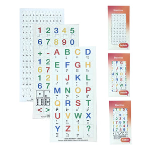 Product photo showcasing the full Hable Stactiles Braille Collection set of 3 without text overlays. The left side displays three overlapping tactile sticker sheets: a sheet with small clear tiny braille stickers, a sheet with bright colorful braille numbers, math operators, and dice patterns, and a main sheet with large, colorful alphabet letters (A–Z) accompanied by tactile braille dots underneath. On the right side, three slim retail boxes show the packaged sticker sheets under the brand names "Stactiles