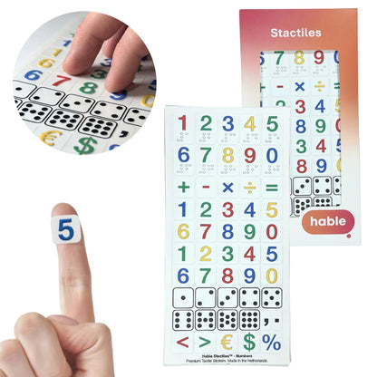 A composite image showing the Stactiles Numbers set. A circular inset in the top-left shows fingers feeling a sheet of raised stickers. In the bottom-left, a small square sticker with a blue number "5" is placed on a fingertip for scale. The right side shows a full sheet of 51 stickers containing numbers 0–9, math operators (+, -, ×, ÷, =), dice-style dot patterns, and currency symbols (€, $, %) next to the Hable packaging.
