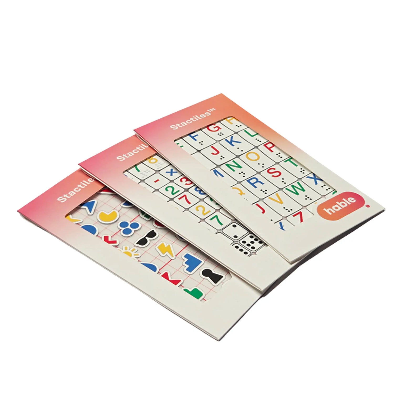 Three Stactiles sticker sheets arranged in a fan layout, showing colorful tactile icons, letters, and numbers on white cards with a pink-to-orange gradient header labeled “Stactiles” and the Hable logo.