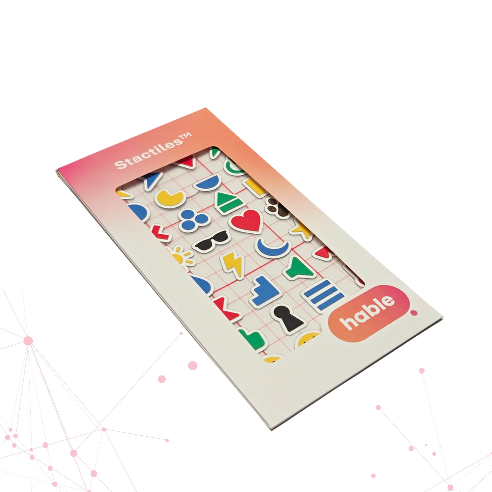 The Stactiles icons sheet in its packaging, displaying colorful raised symbols like arrows, hearts, shapes, and other simple icons through a front window. The packaging features a pink-to-orange gradient header labeled “Stactiles” and the Hable logo at the bottom right.